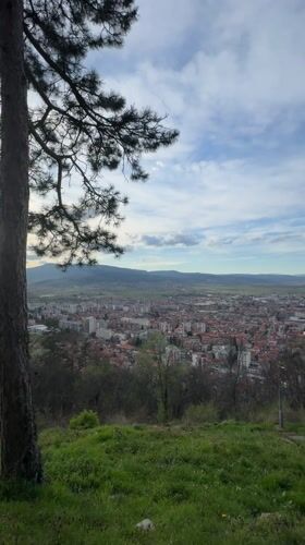 Panoramic view captured of Kyustendil's red-roofed valley cityscape