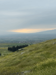 Hillside views captured overlooking Pamukkale town and white terraces