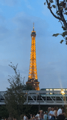 Eiffel Tower and drone light show mark Bastille Day eve in Paris