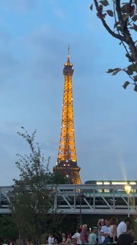 Eiffel Tower and drone light show mark Bastille Day eve in Paris