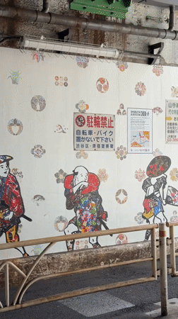 Traditional Japanese street art documented in Shibuya district