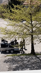 Military personnel load ATVs in Zlatograd Bulgaria schoolyard
