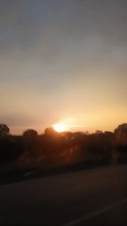 Sunset filmed from moving vehicle near Julia, Ecuador