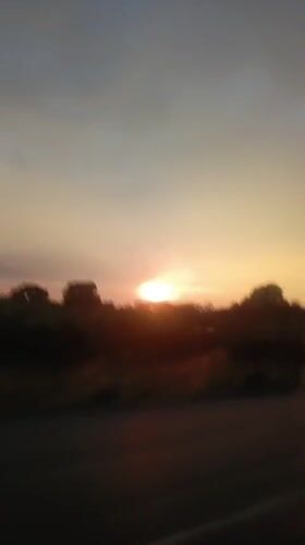 Sunset filmed from moving vehicle near Julia, Ecuador