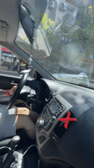 Man drives leisurely through sunny Plovdiv streets