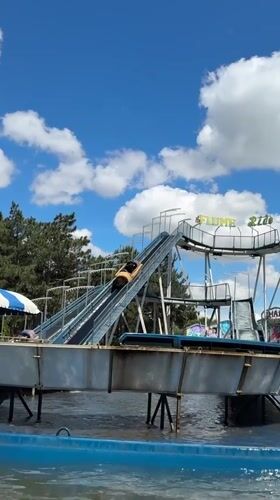Amusement park activities documented in Anapa, Russia during morning hours