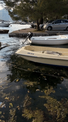 Quiet afternoon at Dobrota harbor, Montenegro boats and selfie