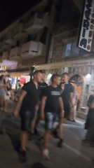 Sutomore's summer night scene: street crowds and outdoor DJ sets