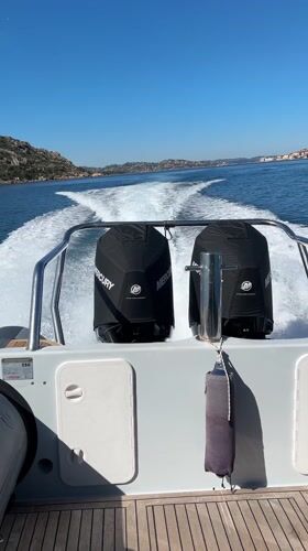 Speedboat cruises waters off La Maddalena, Italy