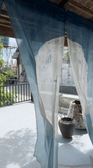Tea ceremony underway at a rustic Chiang Mai café
