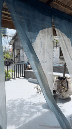 Tea ceremony underway at a rustic Chiang Mai café