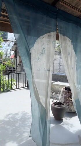 Tea ceremony underway at a rustic Chiang Mai café