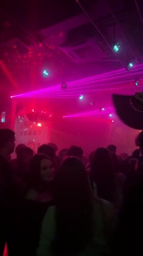 Moscow nightclub draws crowds under colorful laser light display