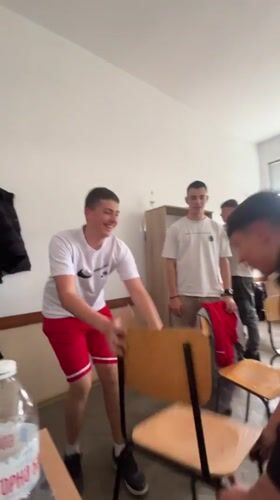 Bulgarian students engage in casual classroom antics during school day