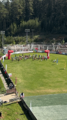Running event draws crowds to outdoor stadium under sunny skies