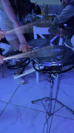Drummer performs with fire element in Bulgarian restaurant