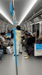 Passengers ride subway train in Jiangjin, China