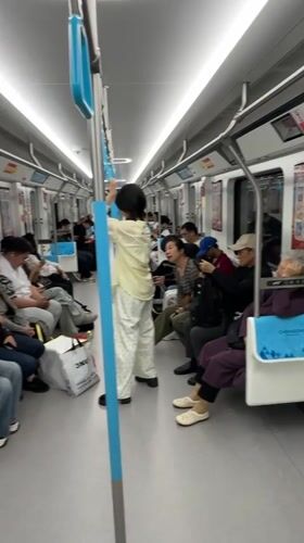 Passengers ride subway train in Jiangjin, China
