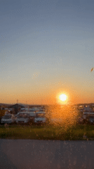 Sunset filmed through vehicle window in Haskovo, Bulgaria