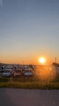 Sunset filmed through vehicle window in Haskovo, Bulgaria
