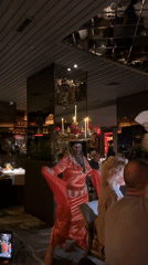 Traditional dancers perform candle-balancing show at Marrakesh restaurant