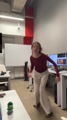 Woman dances, works at Mexico City office early morning