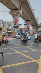 Morning Rush Hour Traffic Documented at Dhaka Metro Intersection