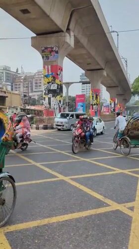 Morning Rush Hour Traffic Documented at Dhaka Metro Intersection