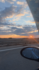 Sunset observed from highway vehicle near Sofia, Bulgaria