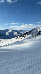 Clear skies over snow-covered Kirovsk mountain slopes captured