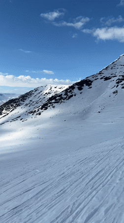 Clear skies over snow-covered Kirovsk mountain slopes captured