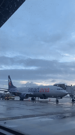 Rainy day airport operations documented in Sochi