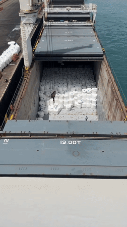Cargo ship loading operations documented at Colombian port