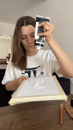 Artist creates painting in Limassol workspace during afternoon session