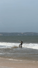 Kitesurfers work choppy waves along Vietnam's Mũi Né coast