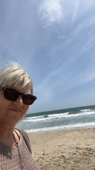 Woman photographed in profile on Palavas-les-Flots beach