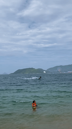 Kitesurfing session off Nha Trang's busy beach
