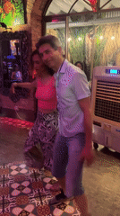 Couple dances at indoor party in Nha Trang