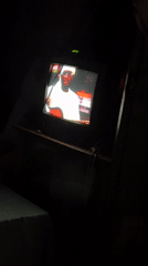 Evening television viewing in decorated room, Bukuru Nigeria