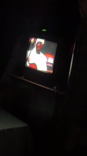 Evening television viewing in decorated room, Bukuru Nigeria