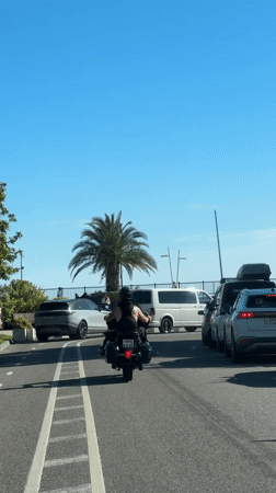 Motorcyclist spotted riding through Sirius, Russia on sunny afternoon
