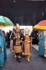 Traditional wedding ceremony and reception setup in Palohgadeng, Indonesia