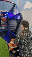 Arcade games and neon lights at Izhevsk's SCANDY play center