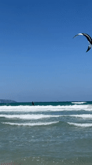Kitesurfing session and beach activities captured in Acre, Israel