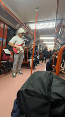 Street musician performs electric guitar on Buenos Aires subway