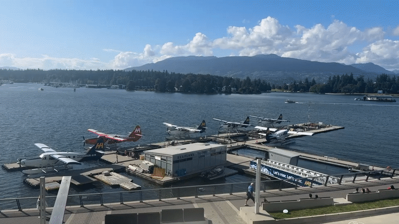 Vancouver waterfront landmarks documented during early morning tourist activity