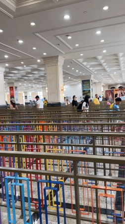 Early morning crowds queue in Nha Trang commercial building