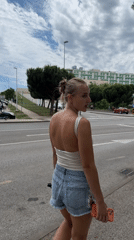 Young people walk, take selfies on Pula sidewalks