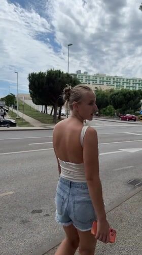 Young people walk, take selfies on Pula sidewalks