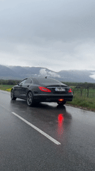 Mercedes parked on wet roadside in Bulgaria